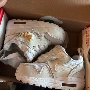 Nike Kids White Sneakers with Pastel Rainbow Stitching